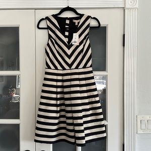 New with tags, Banana Republic V-neck black and white striped dress. Flawless!